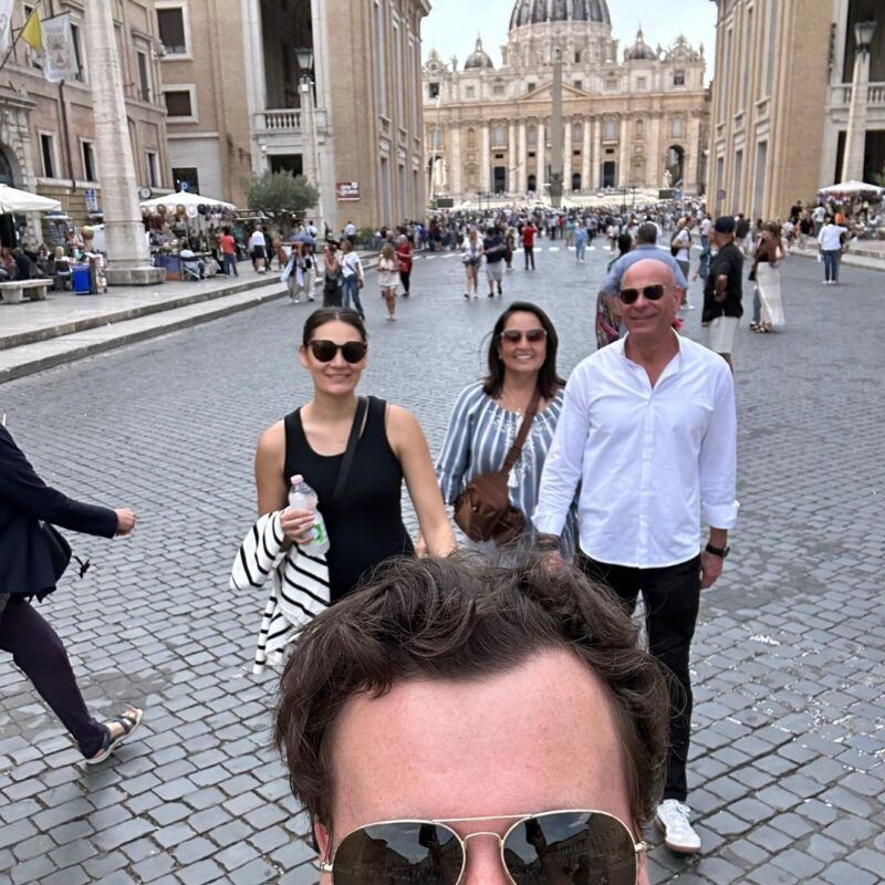 Group selfie in St. Peter's Square with St. Peter's Basilica in the background, Vatican City